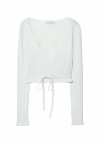 Valkoinen ribbed-wrap-paita pitkillä hihoilla, V-kaula-aukolla ja vyötäröllä solmukiinnityksellä. Ominaisuuksiin kuuluu pehmeä rakenne ja halkiot, joissa on aaltoilevat reunat.