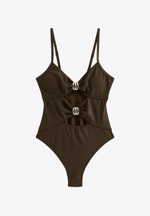 Costume intero marrone scuro con sottili spalline regolabili, parte anteriore ritagliata e due anelli decorativi dorati che collegano i pannelli di tessuto.