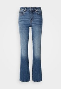 - Jeansy Slim Fit