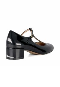 Chaussure Mary Jane en cuir verni noir avec un talon bloc modéré, un design à bride T et un accent de boucle dorée. Fini lisse et brillant.