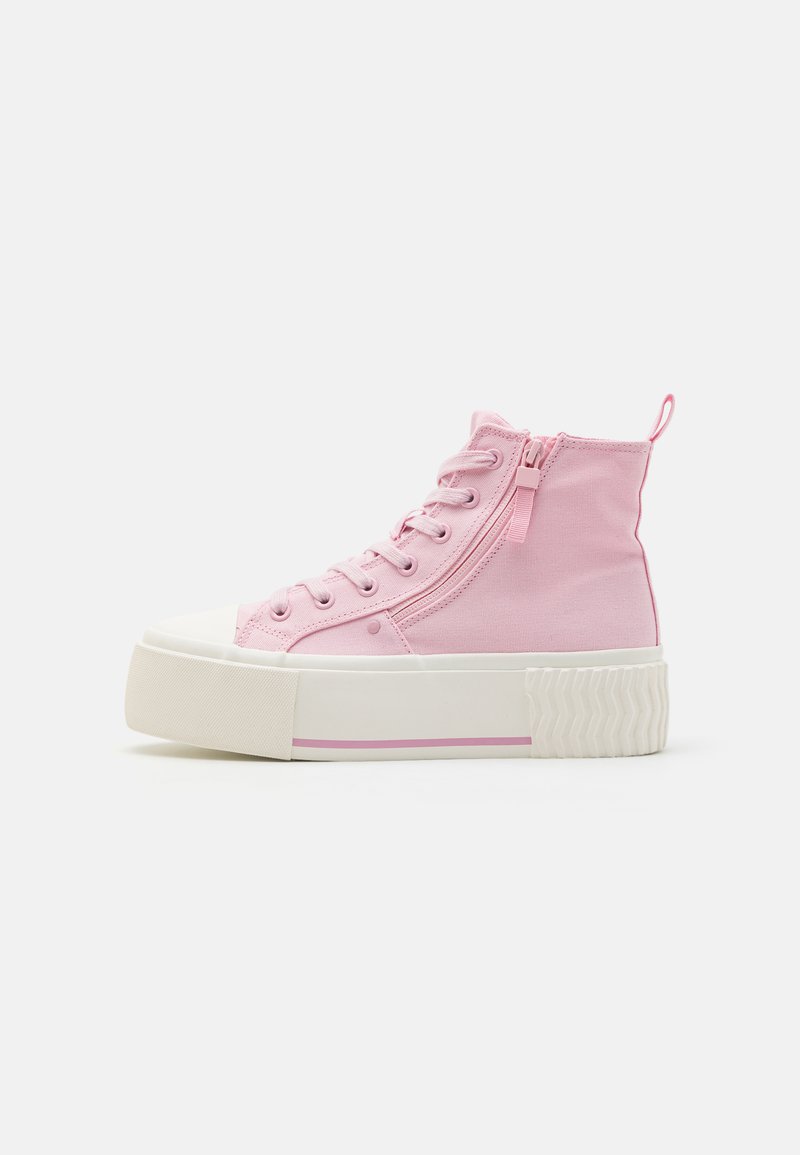 High-top sneakers in soft pink canvas with a white rubber sole, features a zip closure and contrasting pink accent on the sole.