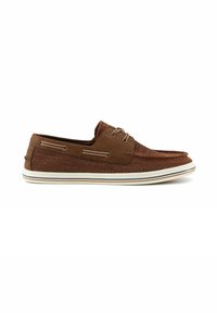 Brown mesh boat shoe with a textured surface, white striped sole, and silver eyelets. Low-cut design suitable for casual wear.