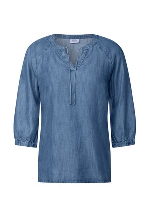 Džínová blůza ve světle modré barvě, s výstřihem do V a stahovací šňůrkou, tříčtvrteční rukávy s elastickými manžetami a volný střih.