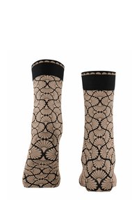 Beige Socken mit einem schwarzen Schalenmuster, versehen mit einem festen schwarzen Rippbund. Hergestellt aus dehnbarem Material für Komfort und Passform.