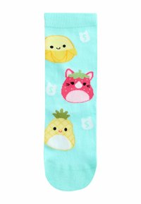 Akvamarinske nogavice s tremi risanimi sadnimi liki: nasmejan rumen limon, rožnata mačka s klobukom iz jagode in rumena ananas.