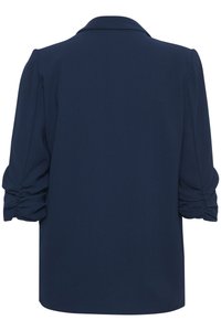 Smeđi mornarsko plavi sako s naboranim dugim rukavima i klasičnim ovratnikom, prikazan straga na bijeloj pozadini.