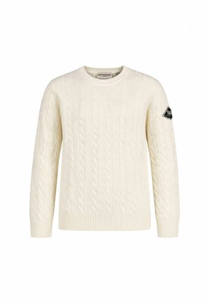 Maglione color crema lavorato a trecce con maniche lunghe e collo rotondo, con una piccola toppa nera sul braccio sinistro.