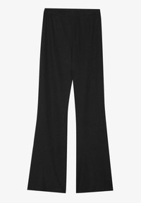 Black flared pants with a textured fabric, featuring an elastic waistband and a loose fit, designed for comfort and ease of movement.
