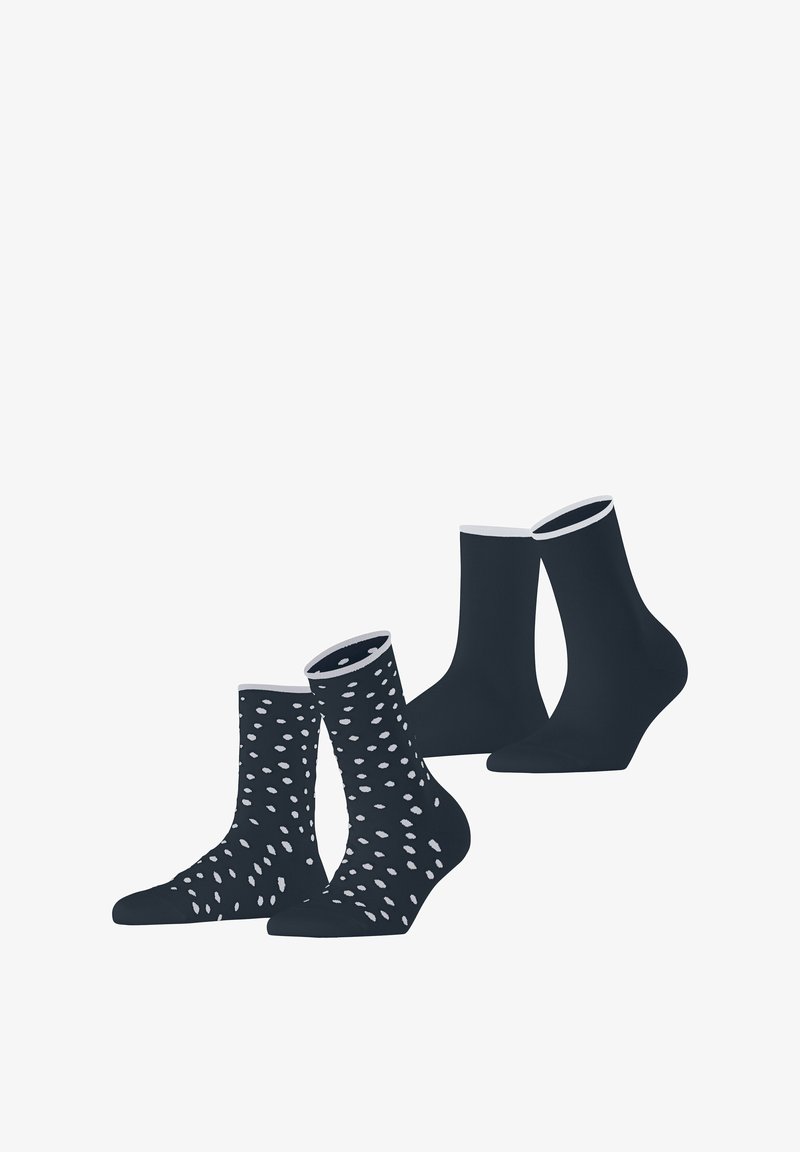 Zwei Paar Baumwollsocken: ein Paar dunkelblau mit weißen Punkten, ein Paar einfarbige dunkelblau. Beide haben kontrastierende weiße Bündchen und eine glatte Textur.