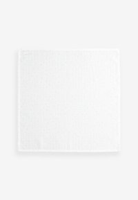 White cloth placemat with subtle light blue and gray dots arranged in a grid pattern, featuring a textured fabric and hemmed edges.