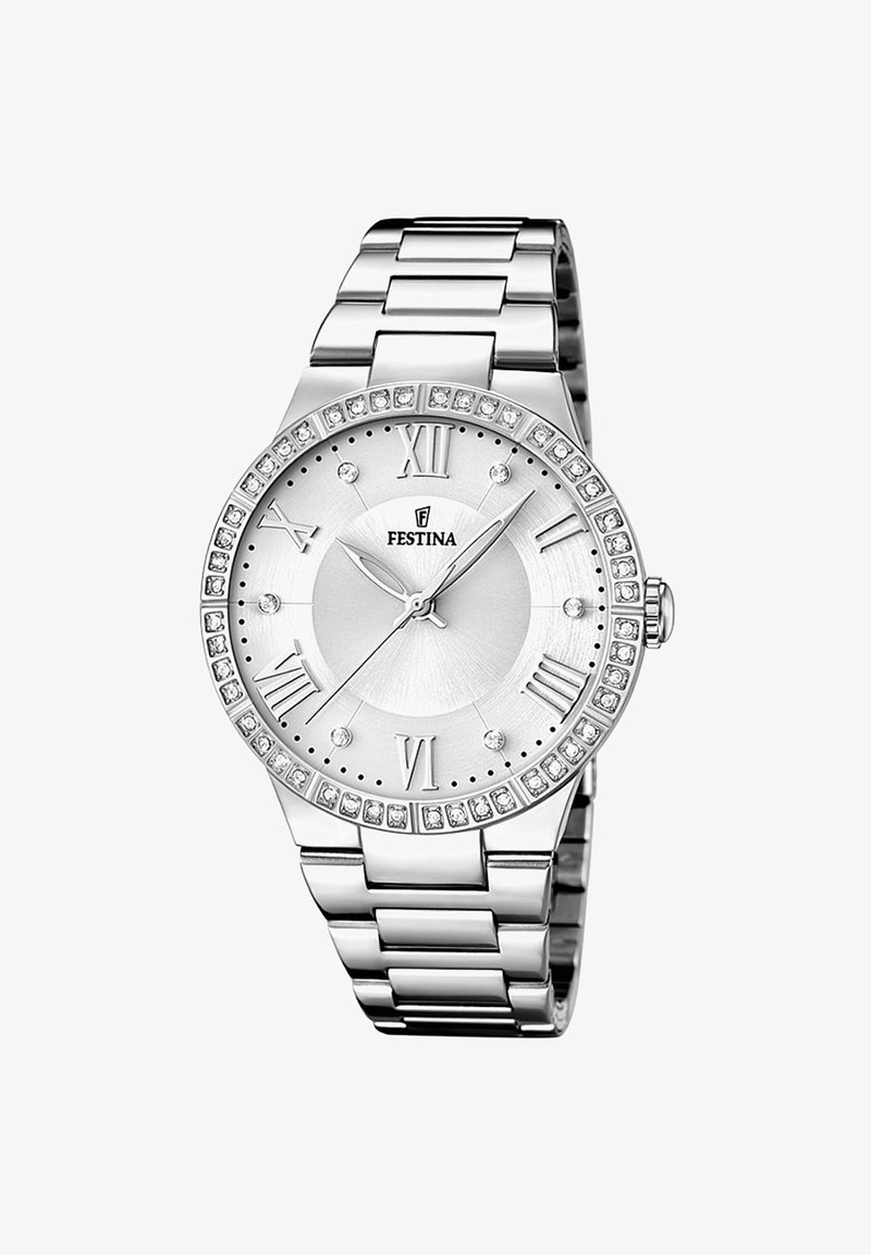 Sudraba metāla rokas pulkstenis ar apaļu korpusu, romiešu ciparu marķieriem, teksturētu seju un kristālu akcentētu apmali.