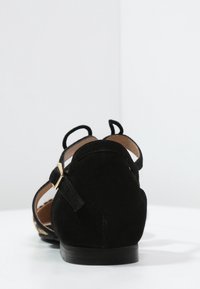 KIOMI Babies - black