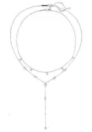 Silver layered necklace featuring delicate chains, scattered heart and round charms, with a drop pendant in a V shape.
