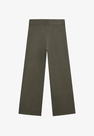 Pantalon large en tricot vert olive avec taille élastique et poignets côtelés, posé à plat sur fond blanc.