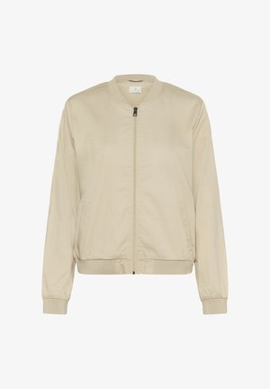 Beige Bomberjacke mit einem Frontreißverschluss, geripptem Kragen und Bündchen sowie seitlichen Taschen. Glattes Material mit matter Oberfläche.