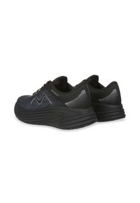 Black athletic shoes with a textured upper, featuring mesh panels and a wavy design. Thick, supportive soles with a rubber tread.