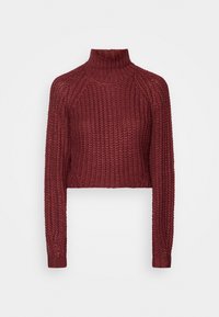 Geknipte turtleneck trui in diep bordeauxrood. Kabelbrei textuur met lange mouwen en geribbelde manchetten. Zachte, chunky ontwerpen.
