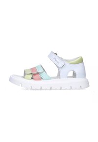 Sandali bianchi per bambini con fasce rosa, blu e verdi, fissati con velcro. Suola bianca testurizzata con un motivo di battistrada.