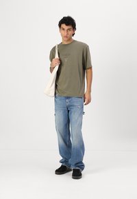 Tommy Jeans JAIMIE LOOSE - Carpenter Jeans - denim medium