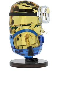 Colorful crystal figurine of a minion character, featuring yellow and blue elements, with a black base and a playful expression.