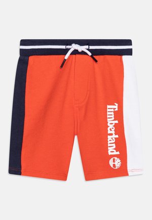 Børneshorts med orange midte, marineblå og hvide sidepaneler, marineblåt taljebånd med hvid stribe, hvid snøre og hvid Timberland-logo på benet.