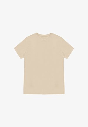 Beżowy t-shirt z krótkim rękawem i okrągłym dekoltem, rozłożony na płasko, pokazujący przód bez widocznych logo lub wzorów.