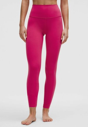 Anliegende Leggings aus leuchtend pinkem Stoff mit glatter Textur. Hoher Taillenbund und knöchellange Passform mit eleganten Nähten.