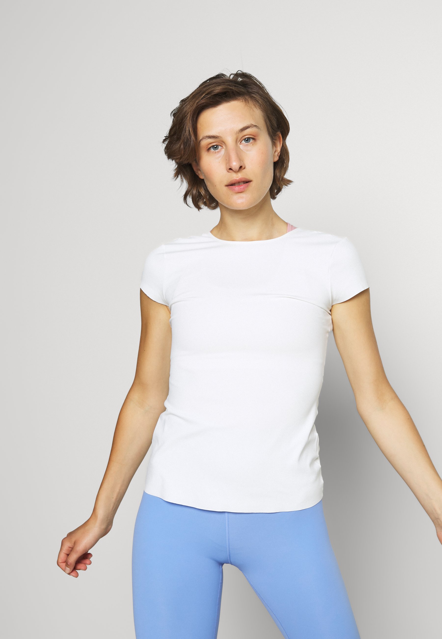 Nike Performance THE YOGA LUXE - Basic T-shirt - sail/white/white -  Zalando.de