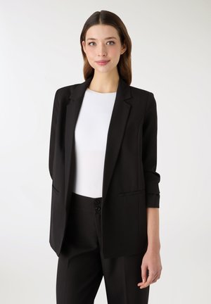 APERTA CON REVER - Cappotto corto - nero