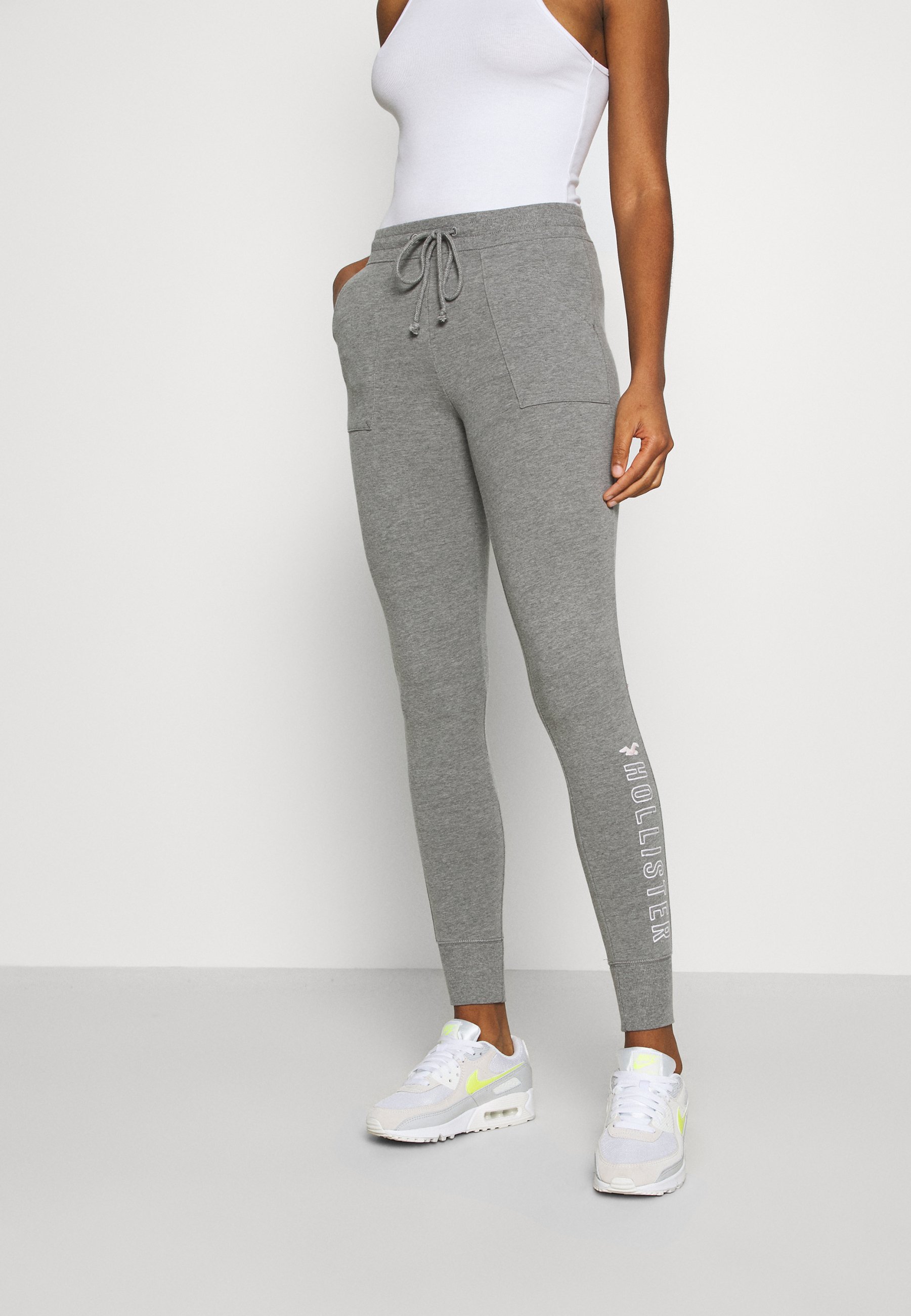 Hollister Co. LOGO FLEGGING Joggebukse medium greygrå Hollister Co. GRAPHIC - Leggings - black