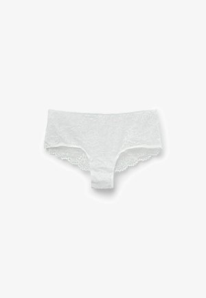 Culotte hipster en dentelle blanche avec un motif floral, des bords festonnés et une ceinture lisse. Texture douce avec une couverture minimale.