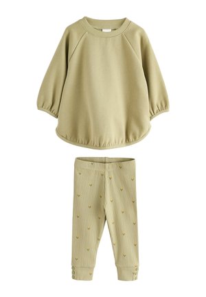 Light green toddler outfit with a long-sleeve sweatshirt and ribbed pants with small yellow flower patterns and button details on cuffs.