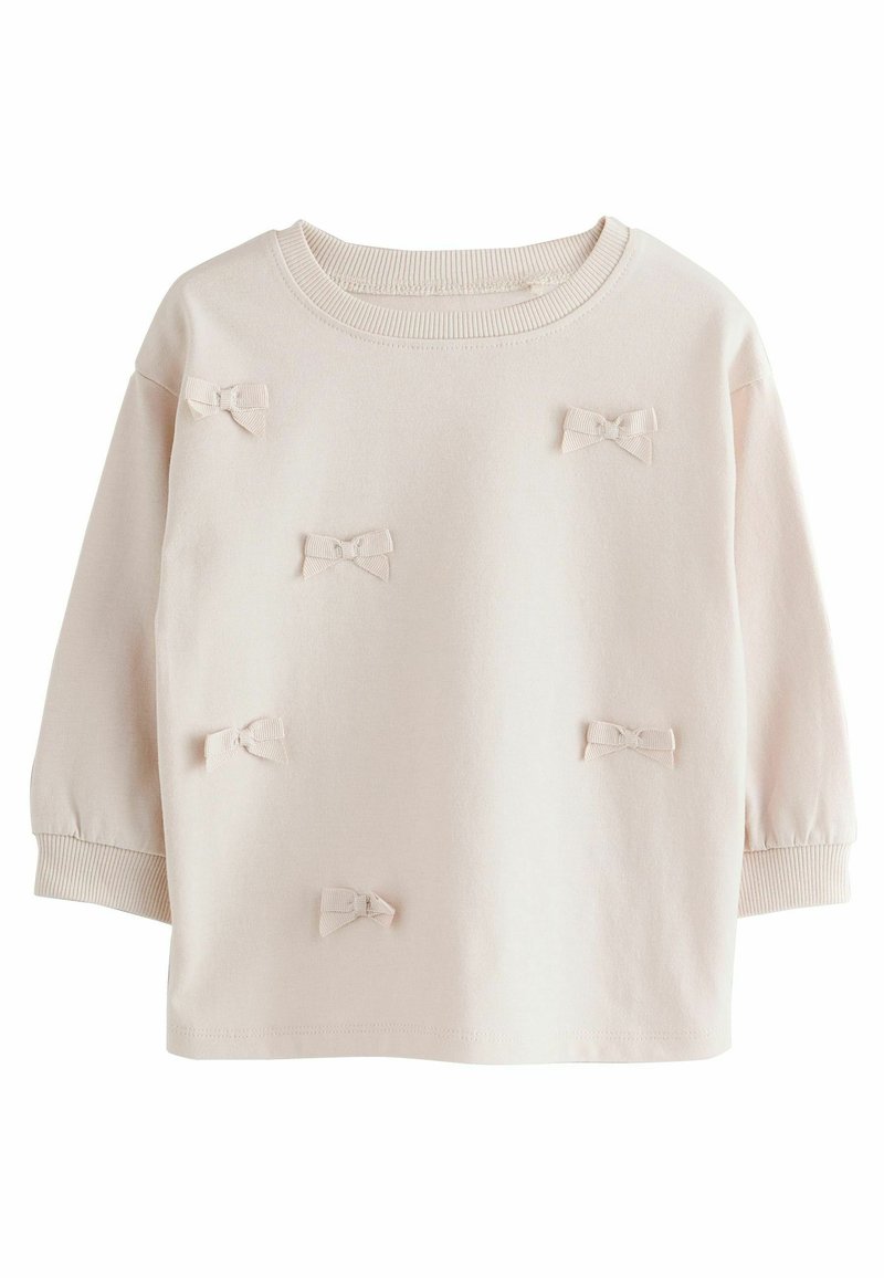 Light pink sweatshirt with a round neckline and three-quarter sleeves. Decorated with small fabric bows evenly spaced across the front.