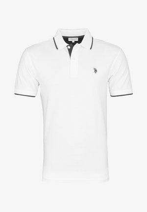 Bílá polo košile s černými akcenty, krátkými rukávy, dvouknoflíkovou légou a malým vyšitým logem na hrudi. Měkká bavlněná tkanina.