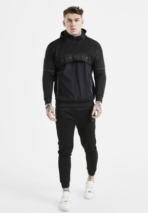 PANELLED JOGGERS - Pantalones deportivos - black