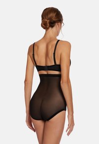 Bodysuit noir avec une texture transparente, des bretelles ajustables et un dos décolleté. Il possède des bandes élastiques à la taille et aux ouvertures des jambes pour un ajustement parfait.