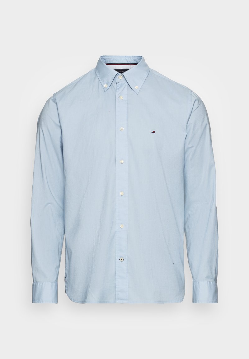 Camicia azzurra a maniche lunghe con bottoni, colletto con bottoni e piccolo logo ricamato sul lato sinistro del petto.