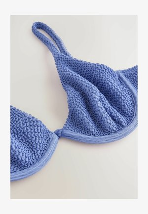 Blue textured bralette featuring a ruffled pattern, adjustable straps, and a smooth underband. The fabric has a soft, stretchy appearance.