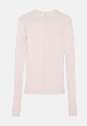 Light pink long-sleeve shirt made of soft fabric with a classic crew neckline and fitted design. No visible patterns or accents.