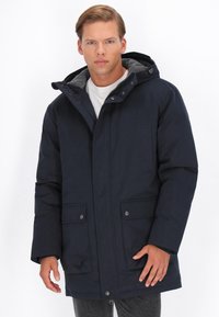 Mørkeblå vinterparka med hætte, frontlynl�ås, trykknapper, to forlommer og en grå inderside. Varme stof, isoleret design.