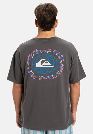 Gray cotton t-shirt with a round graphic design on the back featuring a blue globe and white logo, surrounded by colorful text accents.