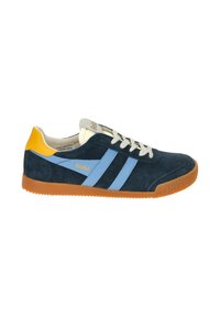 Navy blue suede sneakers with light blue stripes, yellow heel accent, white laces, and textured gum rubber sole. Gola branding on side.