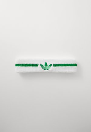 Witte sporthoofdband met twee groene strepen en een geborduurd groen logo dat op een blad lijkt. Gemaakt van zachte, textuurstof.