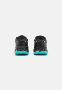 New Balance FRESH FOAM GAROÉ - Trail running shoes - black