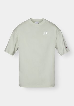 Light green cotton t-shirt featuring a round neckline, short sleeves, and a small white logo on the chest with a logo accent on the sleeve.