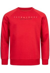 Felpa rossa con collo rotondo, maniche lunghe a raglan e polsini elasticizzati. Stampa 'JACK & JONES Originals' in bianco e nero sul davanti.
