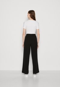 Vero Moda VMJADA WIDE PANTS - Bukser - black