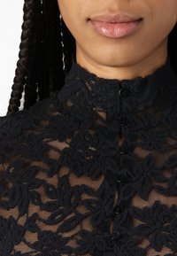 Rosemunde DELICIA - Pikkade varrukatega topp - black
