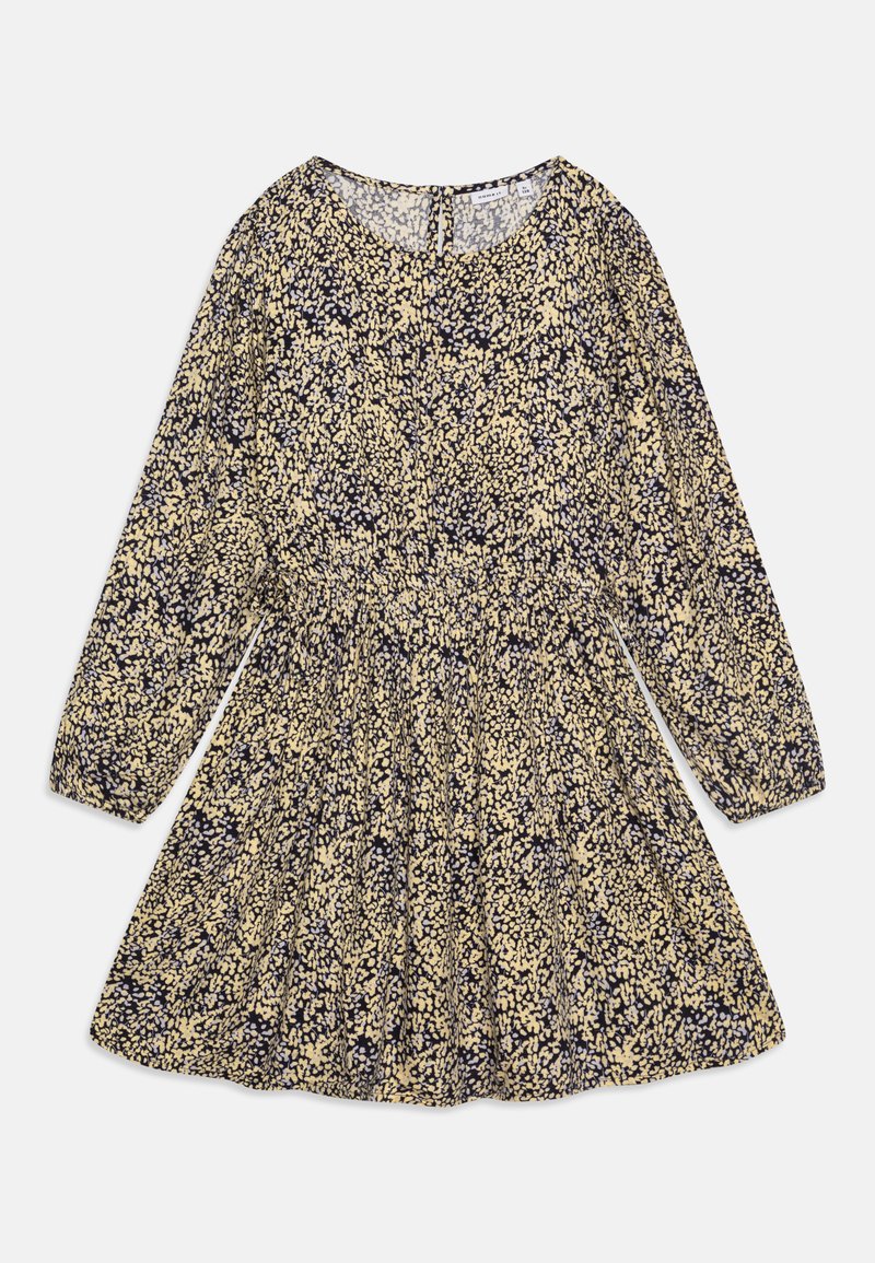 Vestido de manga larga en azul marino con estampado floral en amarillo y blanco. Presenta una cintura fruncida y un escote redondo. Silueta en A.