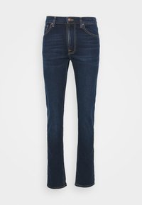 Jeans de ganga azul escuro com um design de perna reta, apresentando cinco bolsos, um fecho de botão e zipper, e costura amarela em contraste.